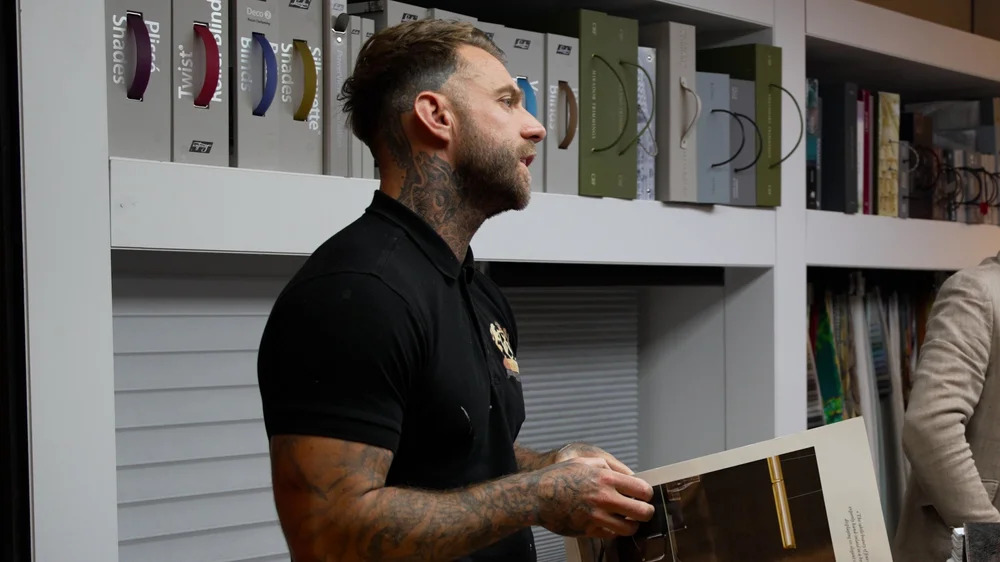 John Skelton reviewing premium architectural wrap samples